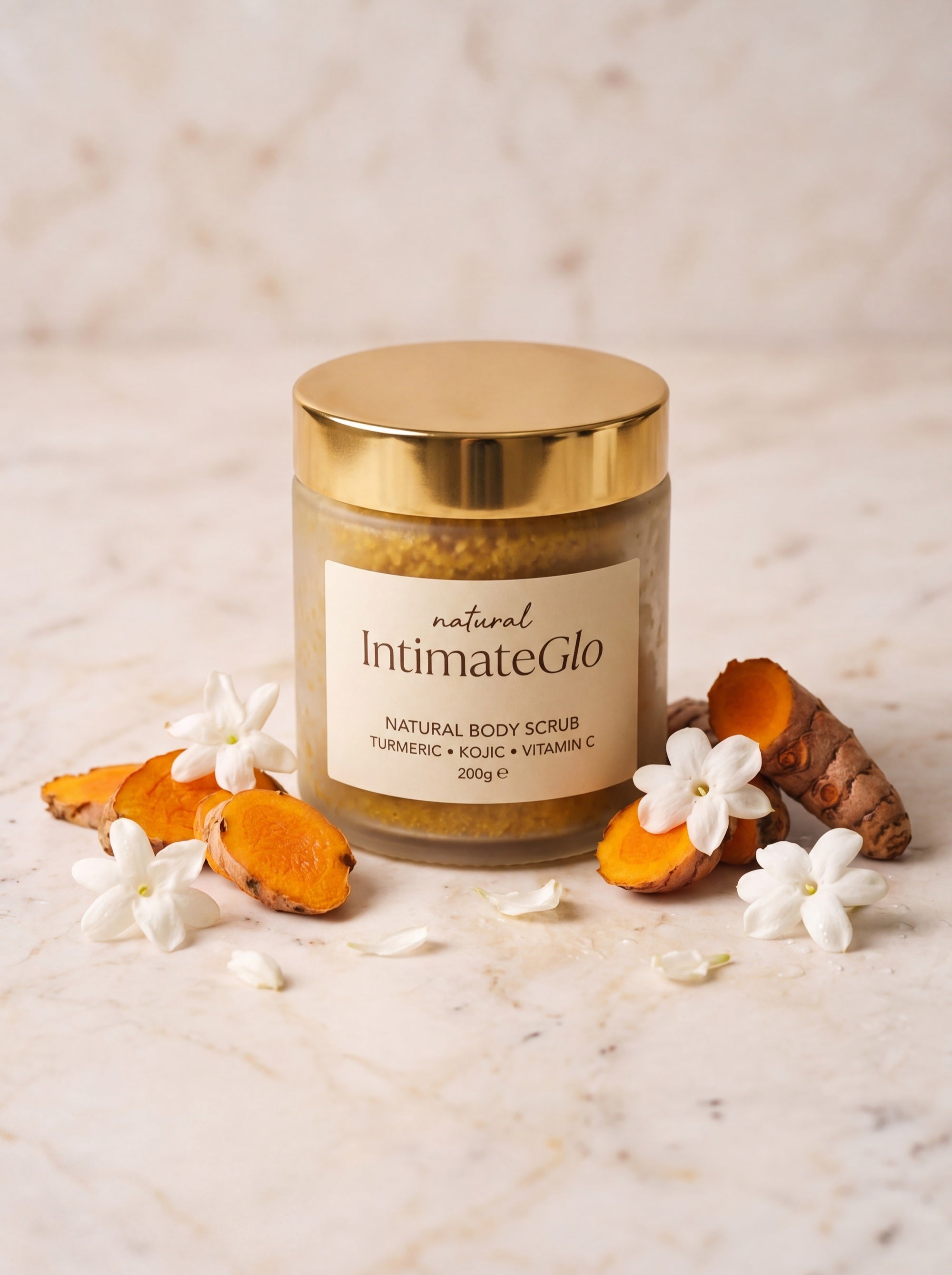 IntimateGlo Turmeric Kojic Acid Brightening Body Scrub - hero product shot with gold lid